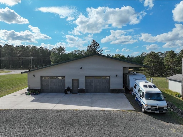 6030 Mitchell Rd, Iron River, WI 54847 - view of side of property featuring a yard, a detached garage, and an outbuilding