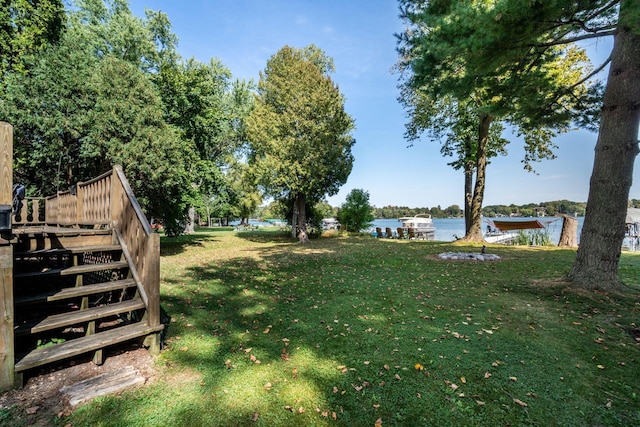 view of yard with a water view