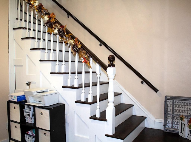 stairs with hardwood / wood-style flooring