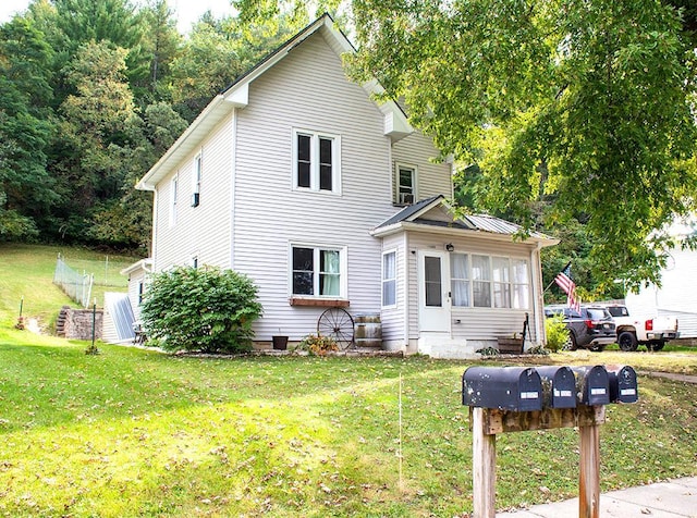 view of front of house with a front lawn