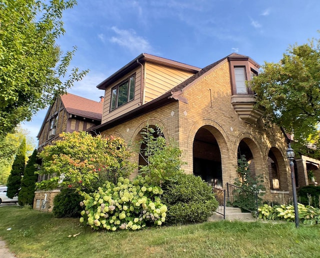 exterior space with a front yard