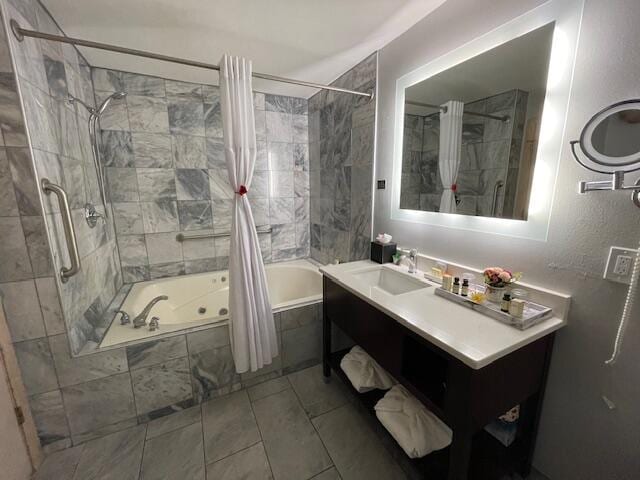 bathroom with shower / tub combo, vanity, and tile patterned floors