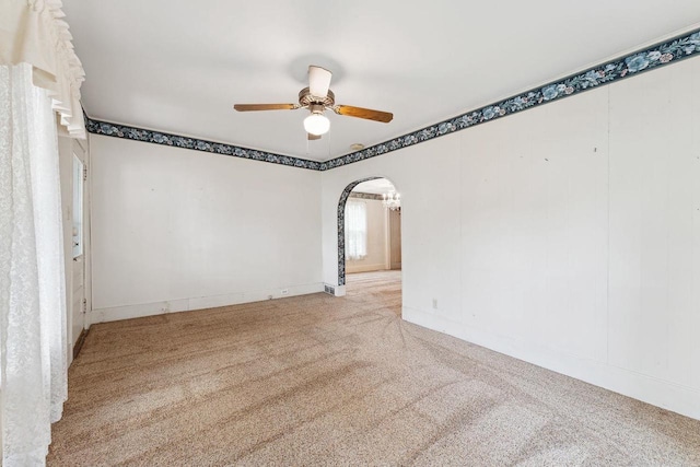 empty room with light carpet and ceiling fan