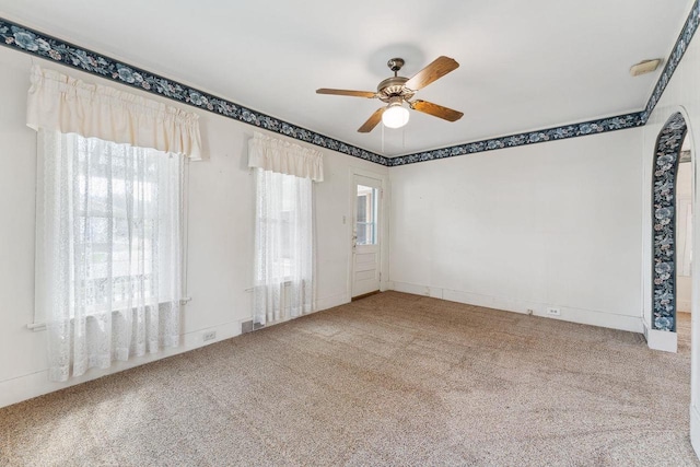 carpeted empty room with ceiling fan