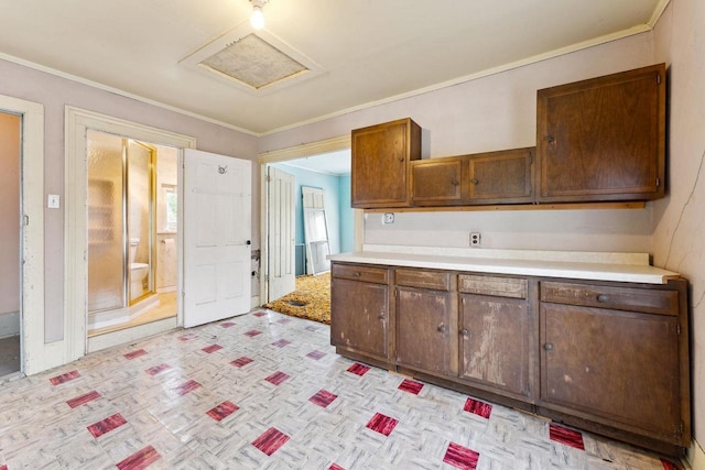 kitchen with plenty of natural light and ornamental molding