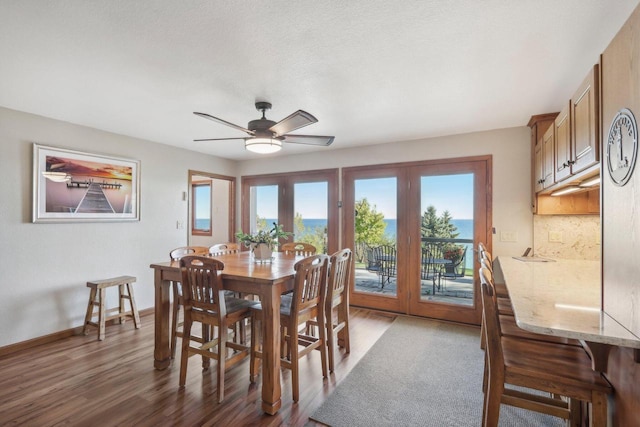 7001 Novak Rd, Racine, WI 53402 - dining area with french doors, plenty of natural light, ceiling fan, and wood finished floors