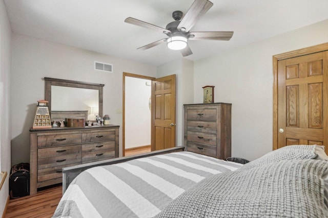 7001 Novak Rd, Racine, WI 53402 - bedroom with wood finished floors and a ceiling fan