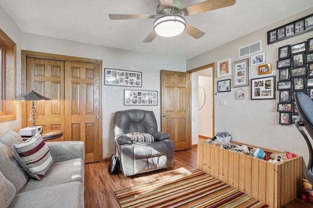 7001 Novak Rd, Racine, WI 53402 - living area with wood finished floors and a ceiling fan