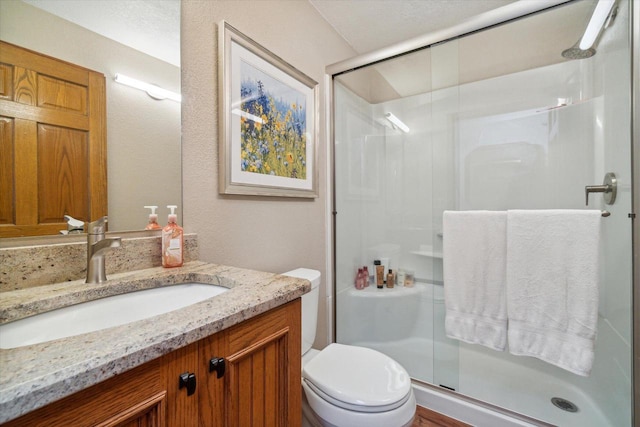 7001 Novak Rd, Racine, WI 53402 - full bathroom featuring a shower stall, vanity, and toilet