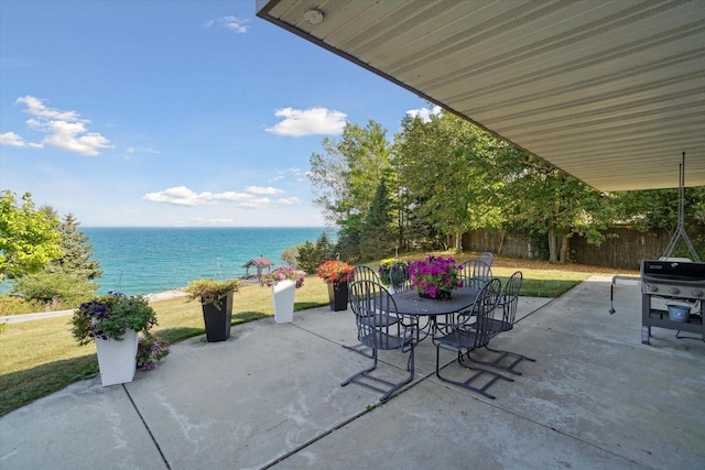 view of patio / terrace featuring a water view