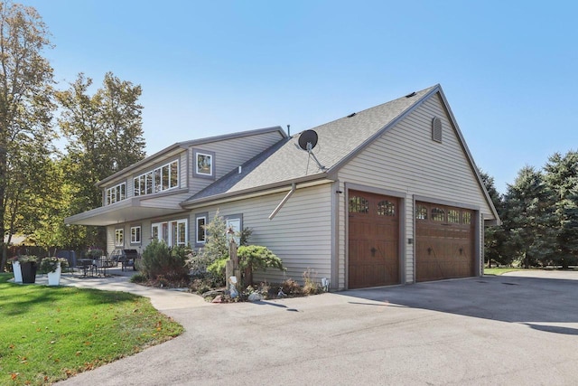 7001 Novak Rd, Racine, WI 53402 - view of home's exterior featuring a shingled roof and a yard