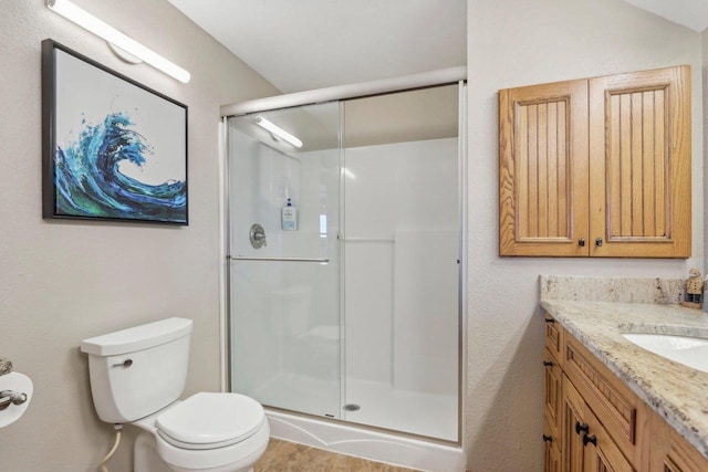 7001 Novak Rd, Racine, WI 53402 - bathroom featuring toilet, a stall shower, and vanity
