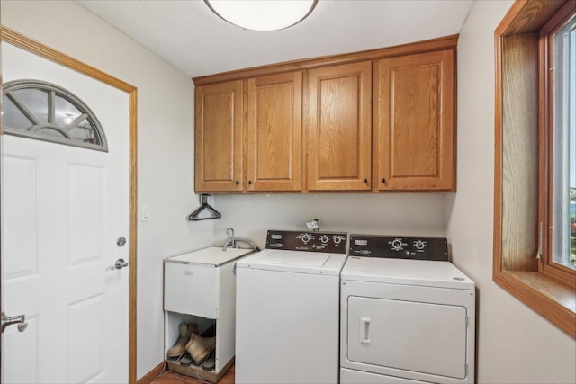 7001 Novak Rd, Racine, WI 53402 - laundry area featuring cabinet space and independent washer and dryer
