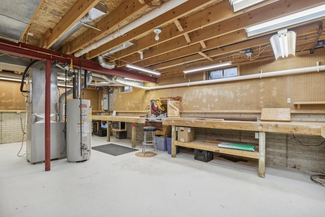 7001 Novak Rd, Racine, WI 53402 - basement featuring a workshop area, water heater, heating unit, and electric panel
