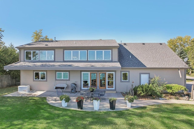 7001 Novak Rd, Racine, WI 53402 - back of property with a patio and roof with shingles