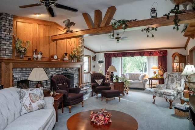 carpeted living room with a brick fireplace, ceiling fan, lofted ceiling, and crown molding