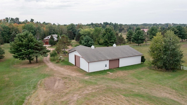 birds eye view of property featuring a rural view