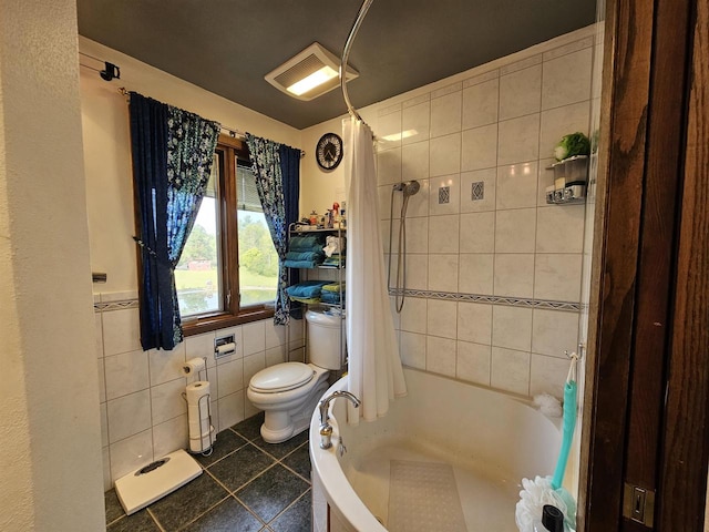 bathroom featuring tile walls, shower / bath combo, tile patterned floors, and toilet