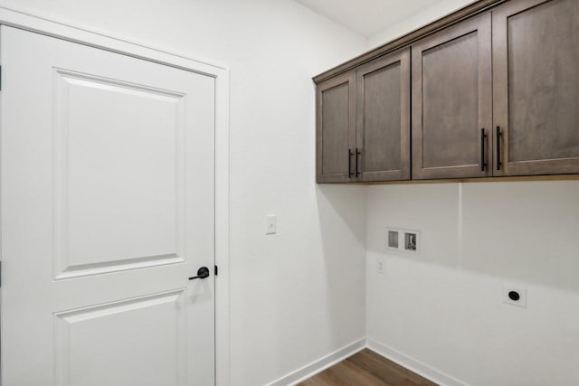 508 Hickory Hollow Rd Unit 0202, Waterford, WI 53185 - clothes washing area featuring washer hookup, cabinets, dark hardwood / wood-style floors, and hookup for an electric dryer