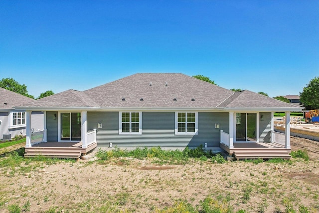 508 Hickory Hollow Rd Unit 0202, Waterford, WI 53185 - back of house with central air condition unit and a wooden deck