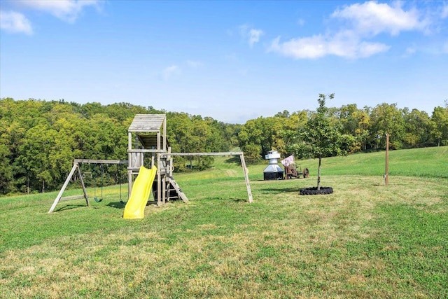 view of playground with a yard