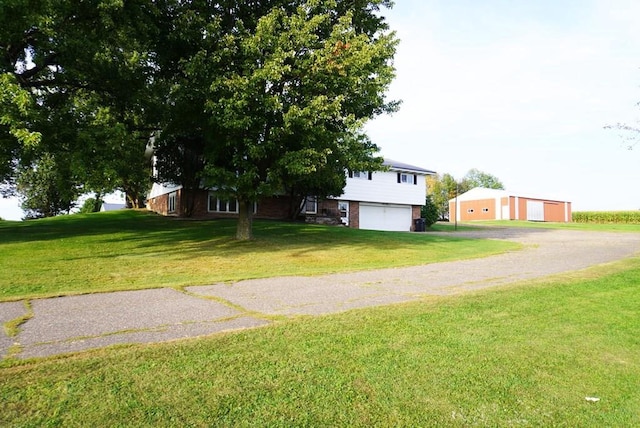 view of yard with a garage