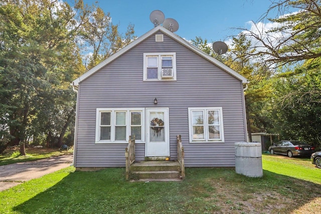 bungalow with a front lawn