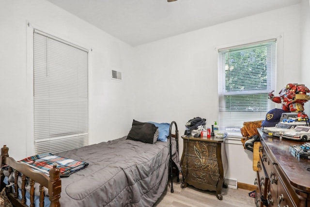 bedroom featuring light hardwood / wood-style flooring