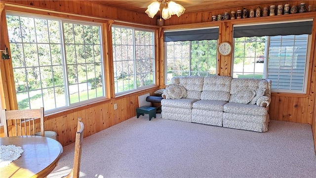 sunroom / solarium with ceiling fan