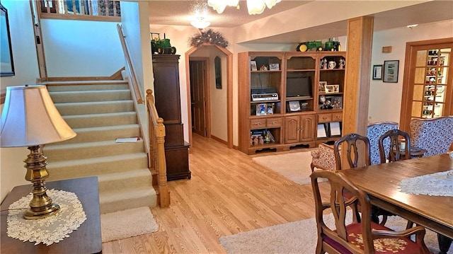 dining area with light hardwood / wood-style flooring