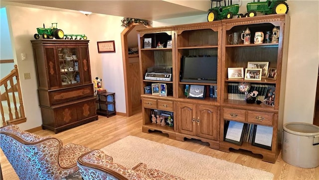 interior space with hardwood / wood-style flooring