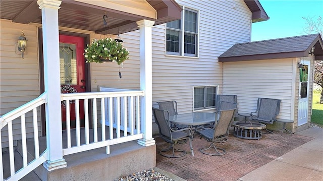 view of patio with an outdoor fire pit