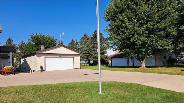 garage with a yard