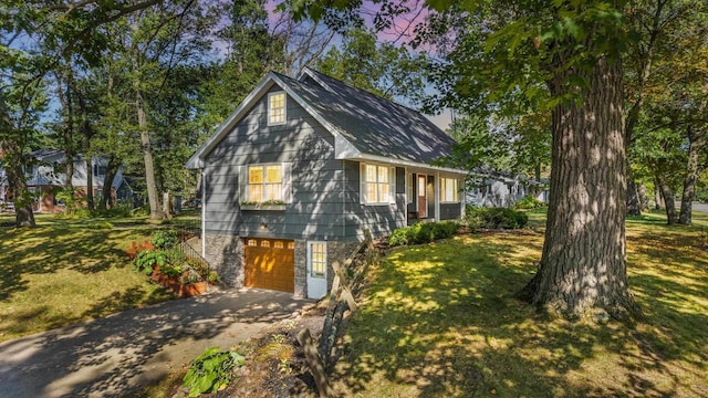 exterior space featuring a yard and a garage