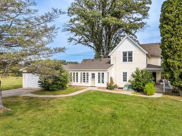 exterior space featuring a yard and a garage