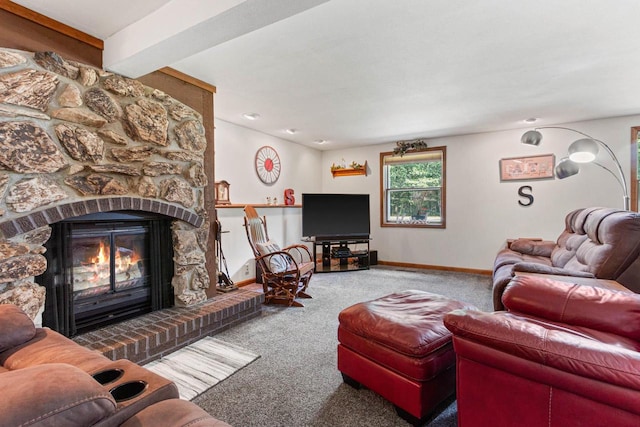 living room featuring beam ceiling, carpet, and a fireplace