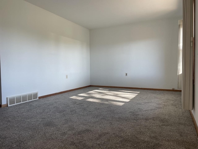 spare room with carpet