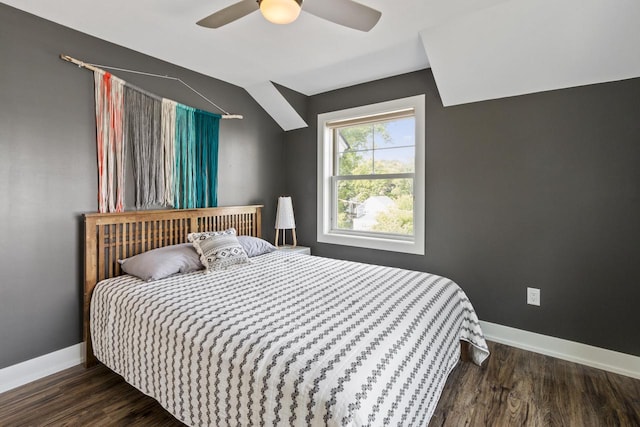 bedroom with ceiling fan and dark wood-type flooring