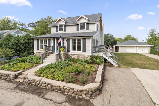 view of front facade featuring a garage and a front lawn