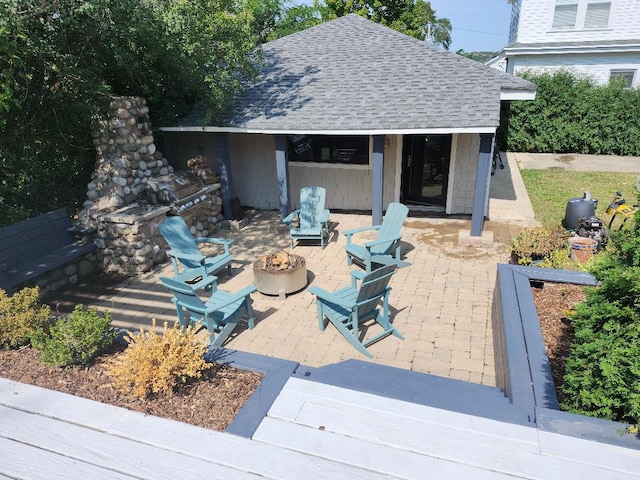 view of patio featuring a fire pit