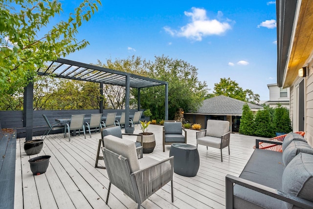 wooden deck with an outdoor living space and a pergola