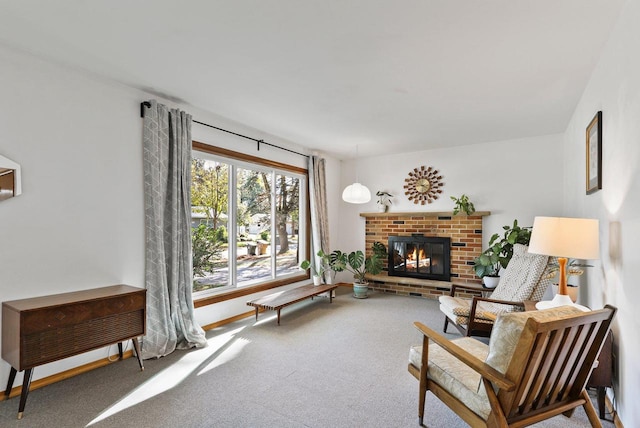 interior space featuring carpet floors and a brick fireplace