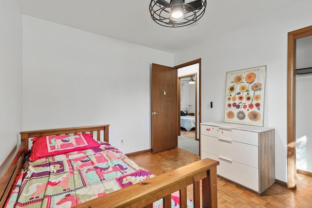 bedroom featuring light parquet floors