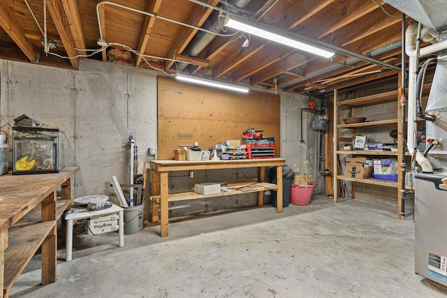 basement with a workshop area