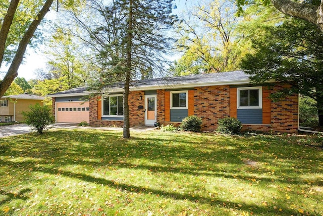 ranch-style home with a garage and a front yard