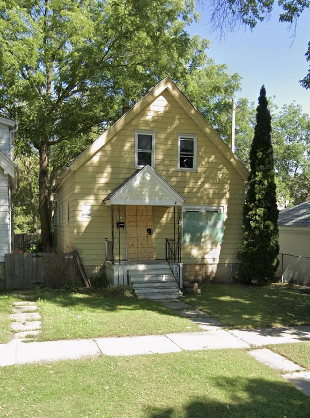 view of front of home with a front yard