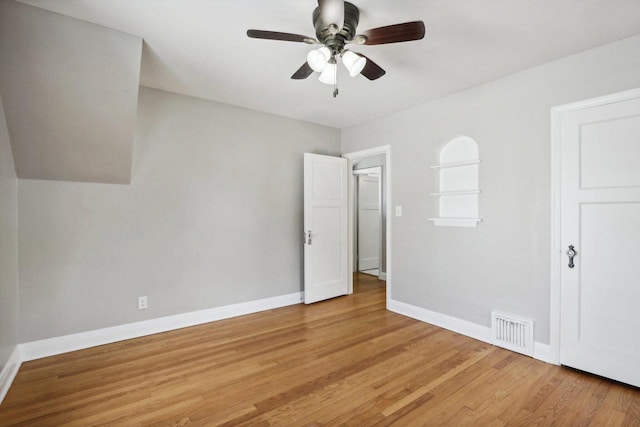 interior space with ceiling fan and light hardwood / wood-style flooring