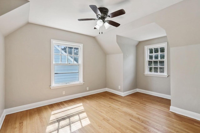 bonus room with ceiling fan, light wood-type flooring, and lofted ceiling