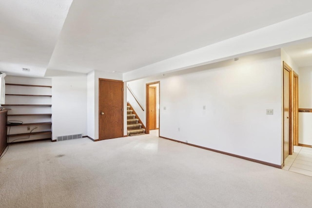 interior space with light colored carpet