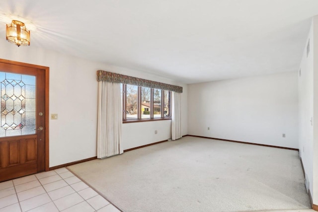 view of carpeted foyer